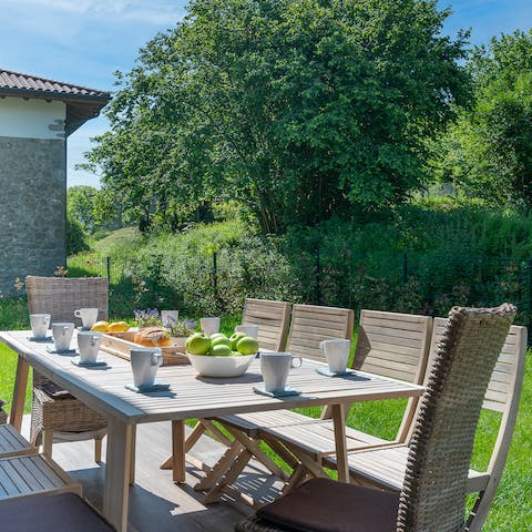 Indulge in a delicious al fresco breakfast in the garden