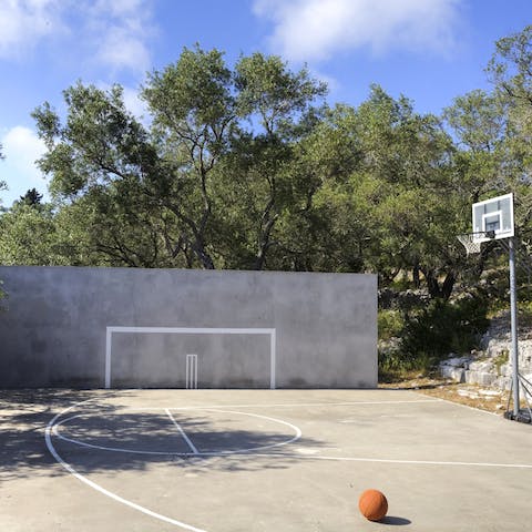 Shoot some hoops in the basketball court