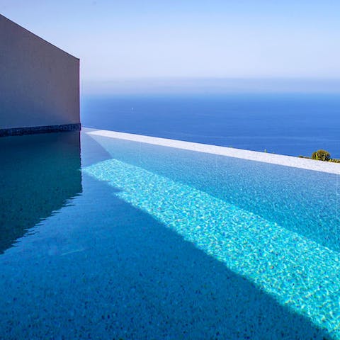 Cool off on balmy summer afternoons with a dip in the sparkling infinity pool