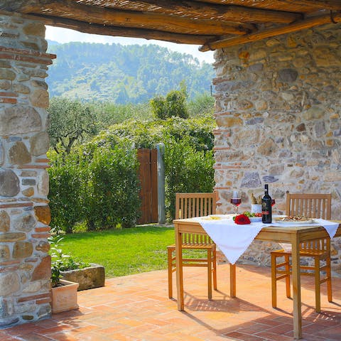 Gather everyone on the covered patio for alfresco nibbles – olives and wine?