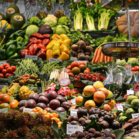 Take in some of the truly delectable scents and sights of La Boqueria market, which can be reached in a thirteen-minute stroll