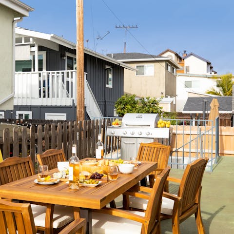 Savour an alfresco barbecue feast on the shared terrace
