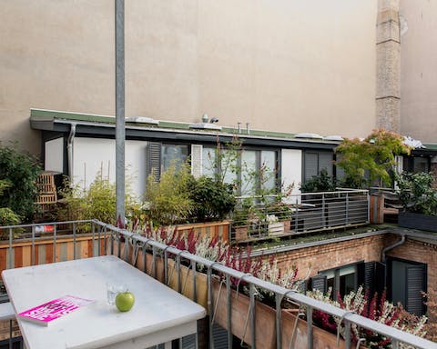 Get some fresh air on the balcony with views over the courtyard