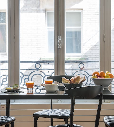 Tuck in to a Parisian breakfast of dreams (fresh pastries, fruit and coffee) from the large dining area 