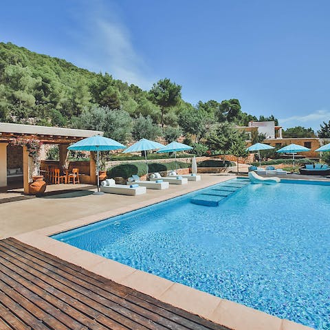 Spend idyllic days lounging by the pool and gazing at the views