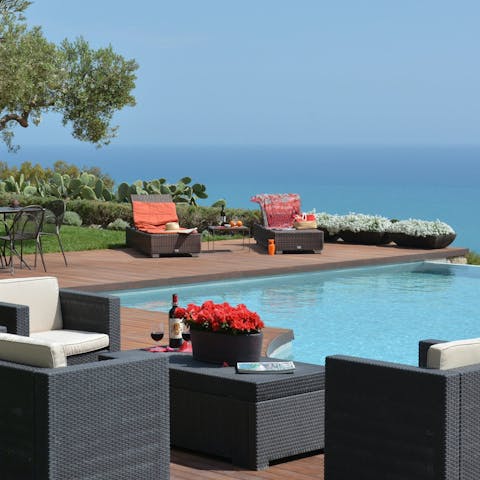 Soak up the panoramic views by the private swimming pool