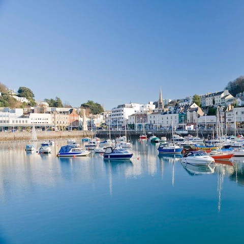 Head out for a wander along Torquay's waterfront and picturesque marina – it's a mile away