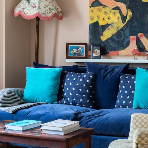 Sink into the cosy blue sofa