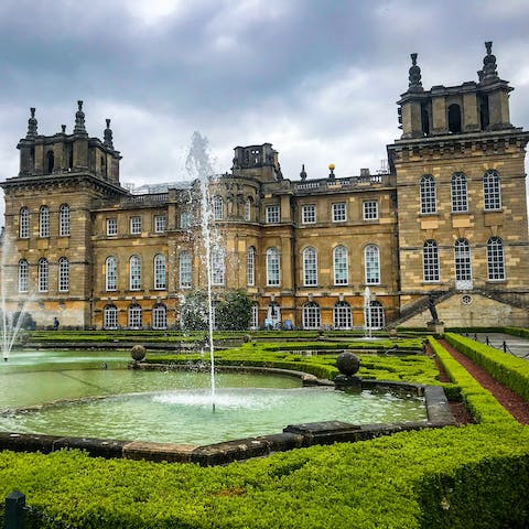 Explore the gilded State Rooms of Blenheim Palace, a five-minute drive away