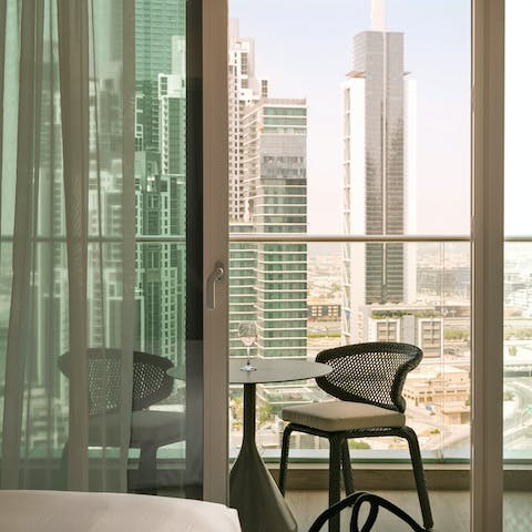 Step out to the balcony and watch the sun go down