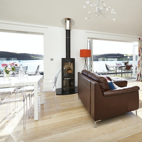 Cosy up by the wood burner – there's nothing more relaxing than looking out at the Cornish coast on a blustery day while you're tucked away inside