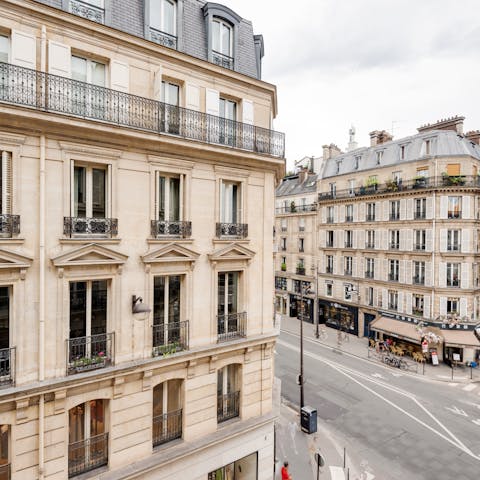 Peer out onto the smart boulevards of the 4th arrondissement below