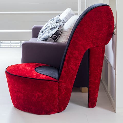 Lie back on the stiletto-shaped, kitsch chair