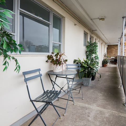 Start the morning with a cup of tea on the little balcony 