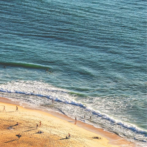 Grab your beach towel and walk down to Praia de Matosinhos