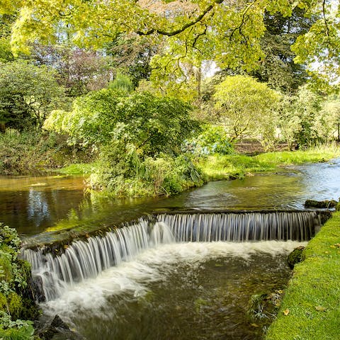 Explore the home's large garden which Gill Beck crosses through