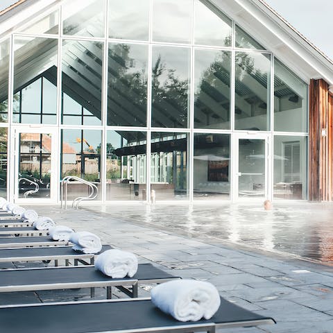 Unwind at the on-site spa featuring pools, a sauna and a fitness centre