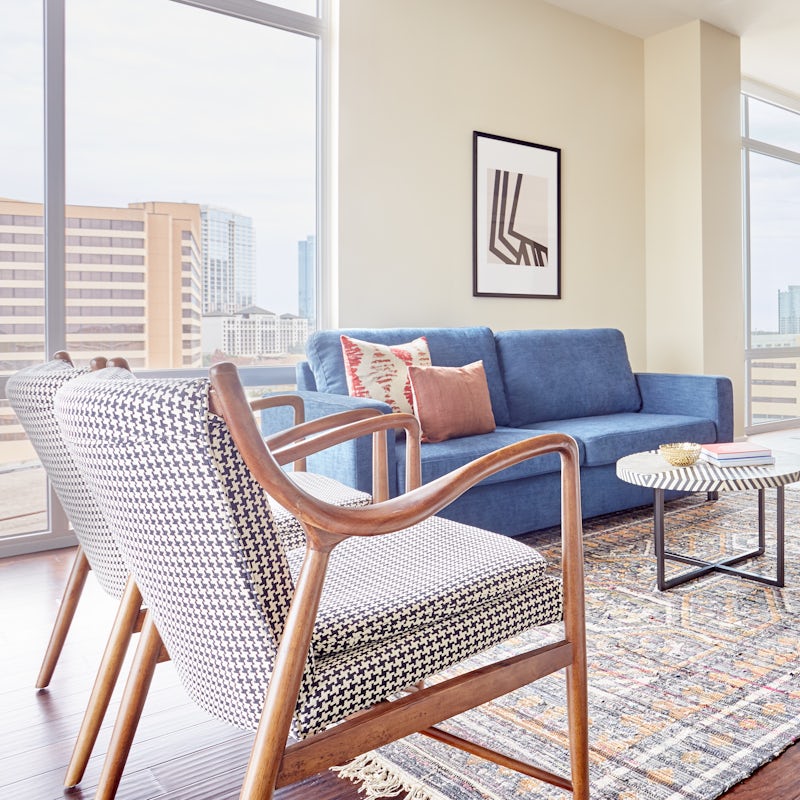 Relax in your home's stylish living room with views