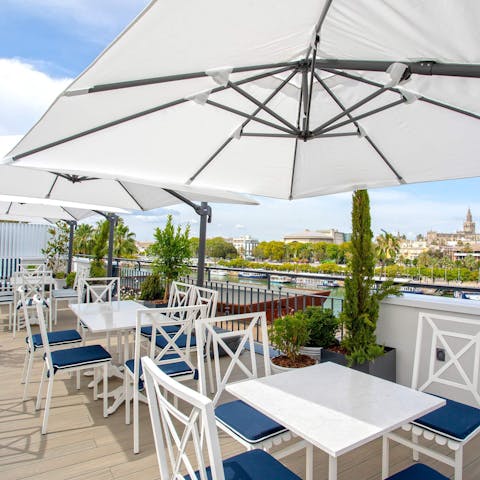 Enjoy a glass of tinto de verano on the shared roof terrace