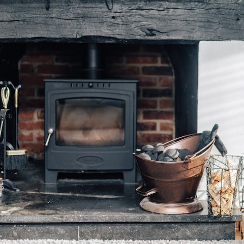 Throw some logs on the fire and curl up on a nearby sofa with a book in hand