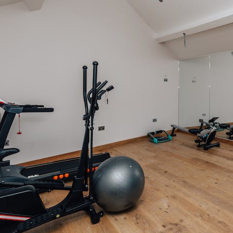 Squeeze in a quick workout in the home's private gym