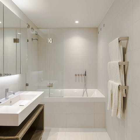 Pamper yourself in the modern and glossy bathrooms