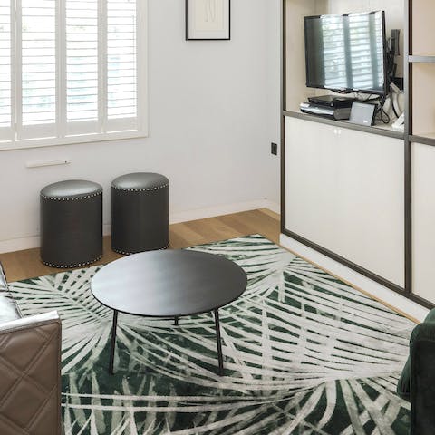 A green palm print rug