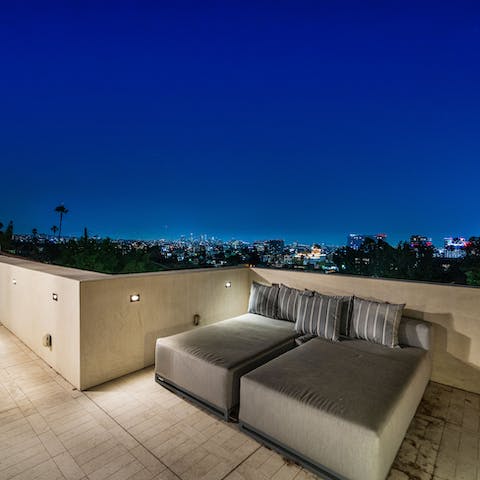 Head up to the balcony and gaze out at LA's sparkling skyline