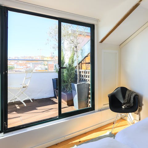 Wake up to light streaming through the panoramic windows in the upstairs bedroom