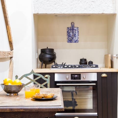 A traditional kitchen with a cauldron