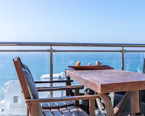 Dine on the balcony with extraordinary views of the Mediterranean Sea
