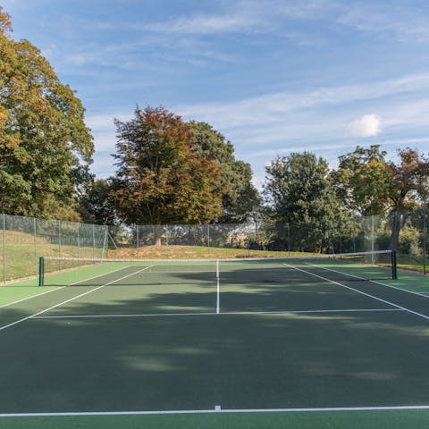 Challenge your friends and family to a game of tennis on your private court