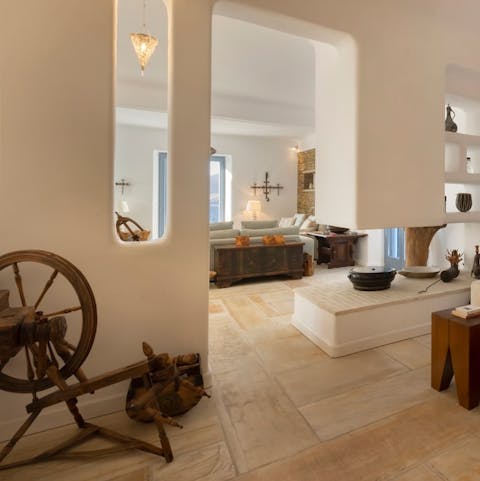 Take in the rural charm of the decor – the old spinning wheel and smoothed stone walls