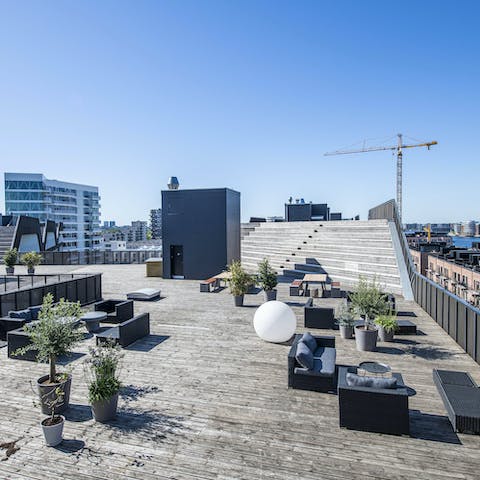 Grab a couple of local craft beers and unwind on the communal rooftop