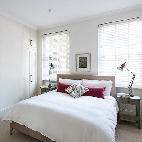 Wake up well rested in the bright and spacious master bedroom