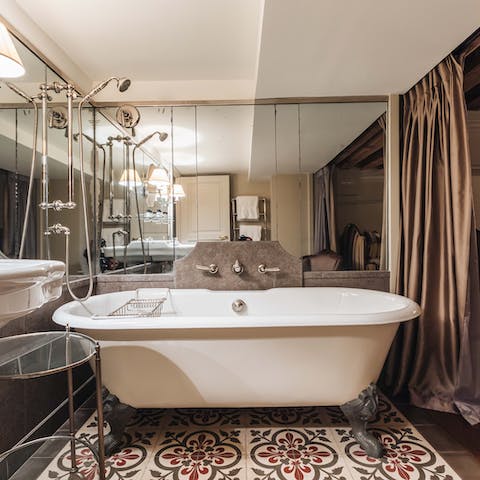 Take a long relaxing soak in the freestanding bathtub
