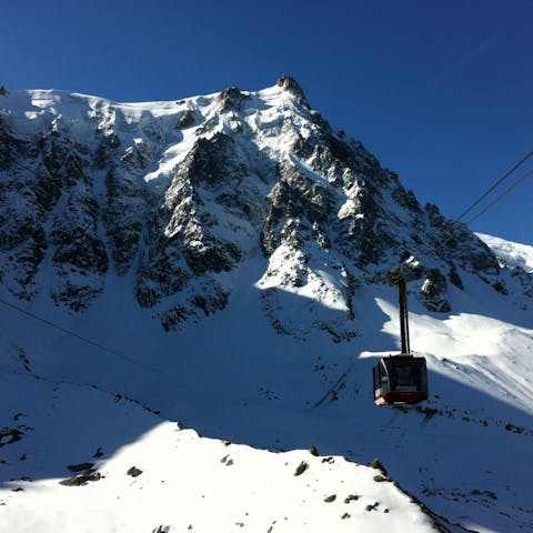 Ride the ski lift to the snowy peaks of Chamonix Mont Blanc