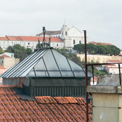 Enjoy the views across the rooftops to Miradouro da Graça from your windows