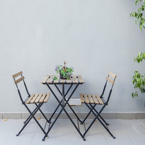 Invite friends onto the big and sunny communal terrace for evening drinks