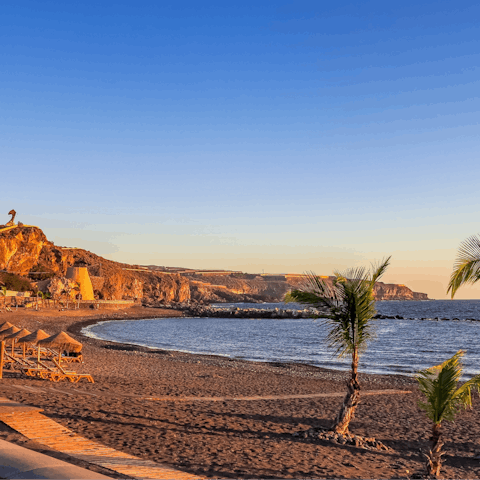 Paddle in the Atlantic at Ajabo beach, a fifteen-minute walk away