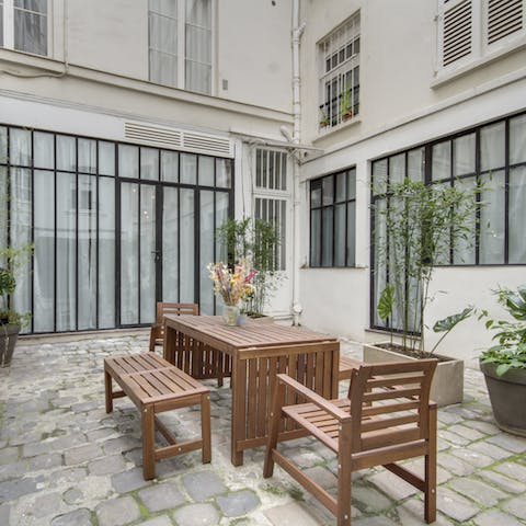 Relax in the private central courtyard