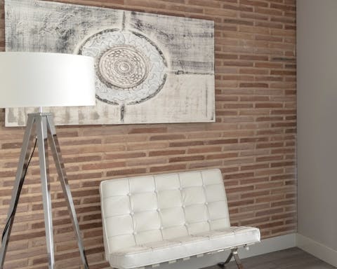 An exposed brick accent wall