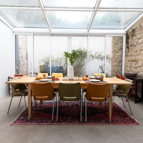 Come together for lazy mealtimes here with heaps of natural light