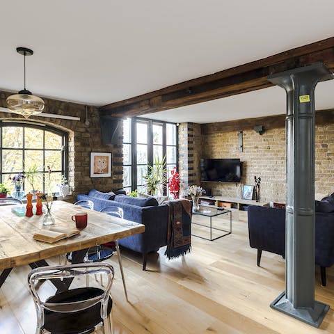 Relax in a characterful home with industrial beams and exposed brick