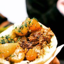 Eat Israeli delicacies at Miznon