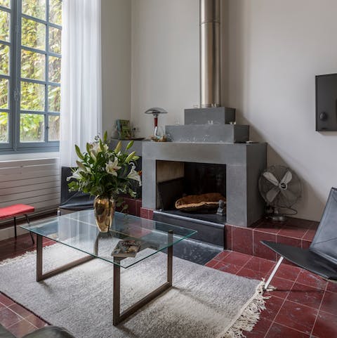 Admire the decorative industrial fireplace and chimney