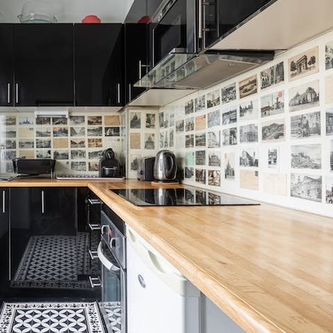 Cook up a storm in the sleek kitchen with the postcard backsplash