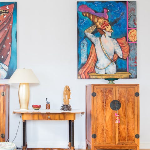 Take in the stunning collection of artwork throughout the apartment