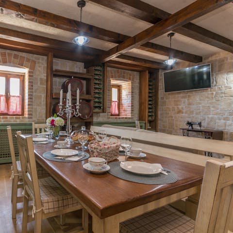 Gather around the cosy wooden table for a home-cooked meal
