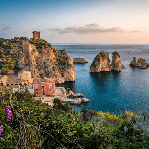 Explore Sicily with Corino beach just a seven-minute walk away